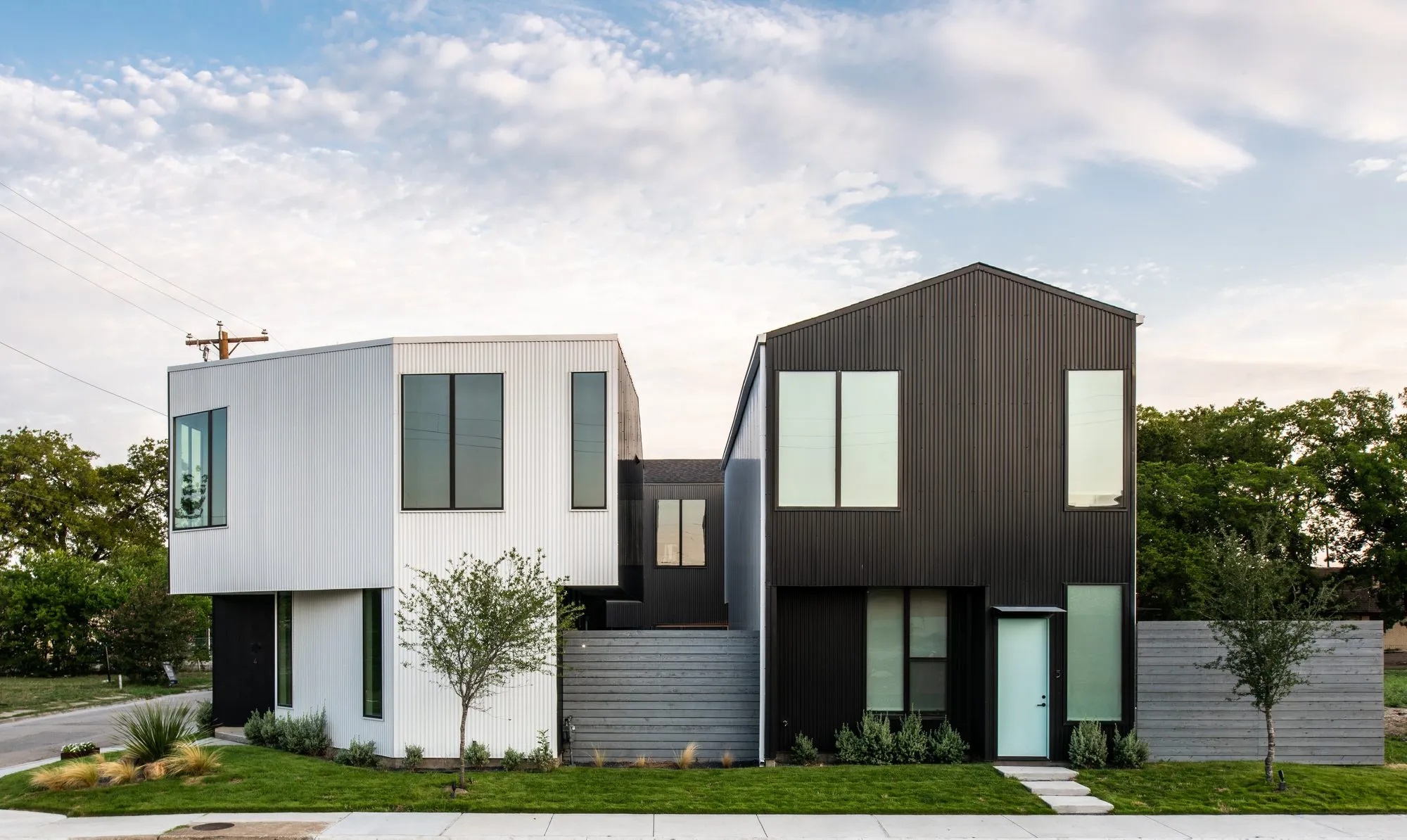 4401 Scurry Street: white and dark townhomes side by side