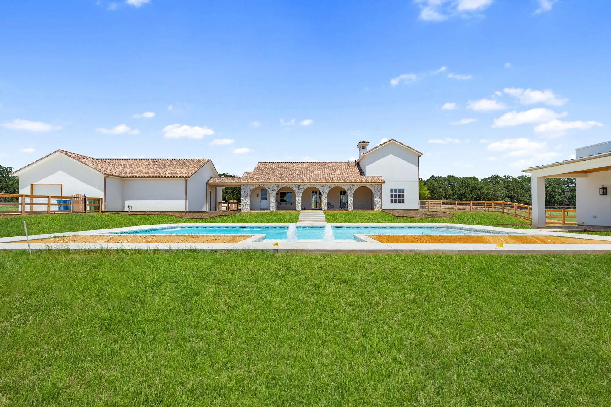 721 Eagles Landing: pool and lawn behind the house