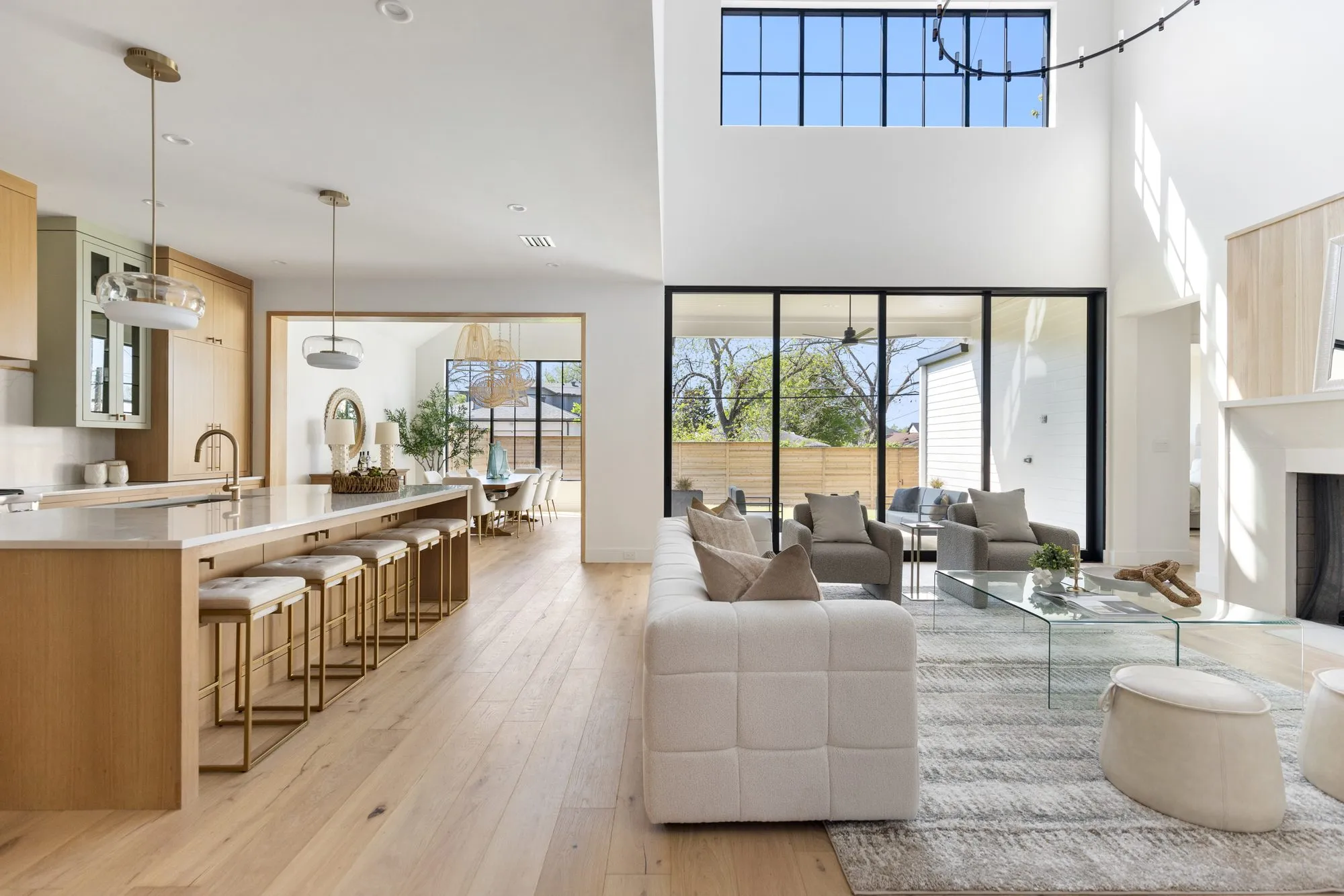3880 Durango: open living room and kitchen under a high ceiling