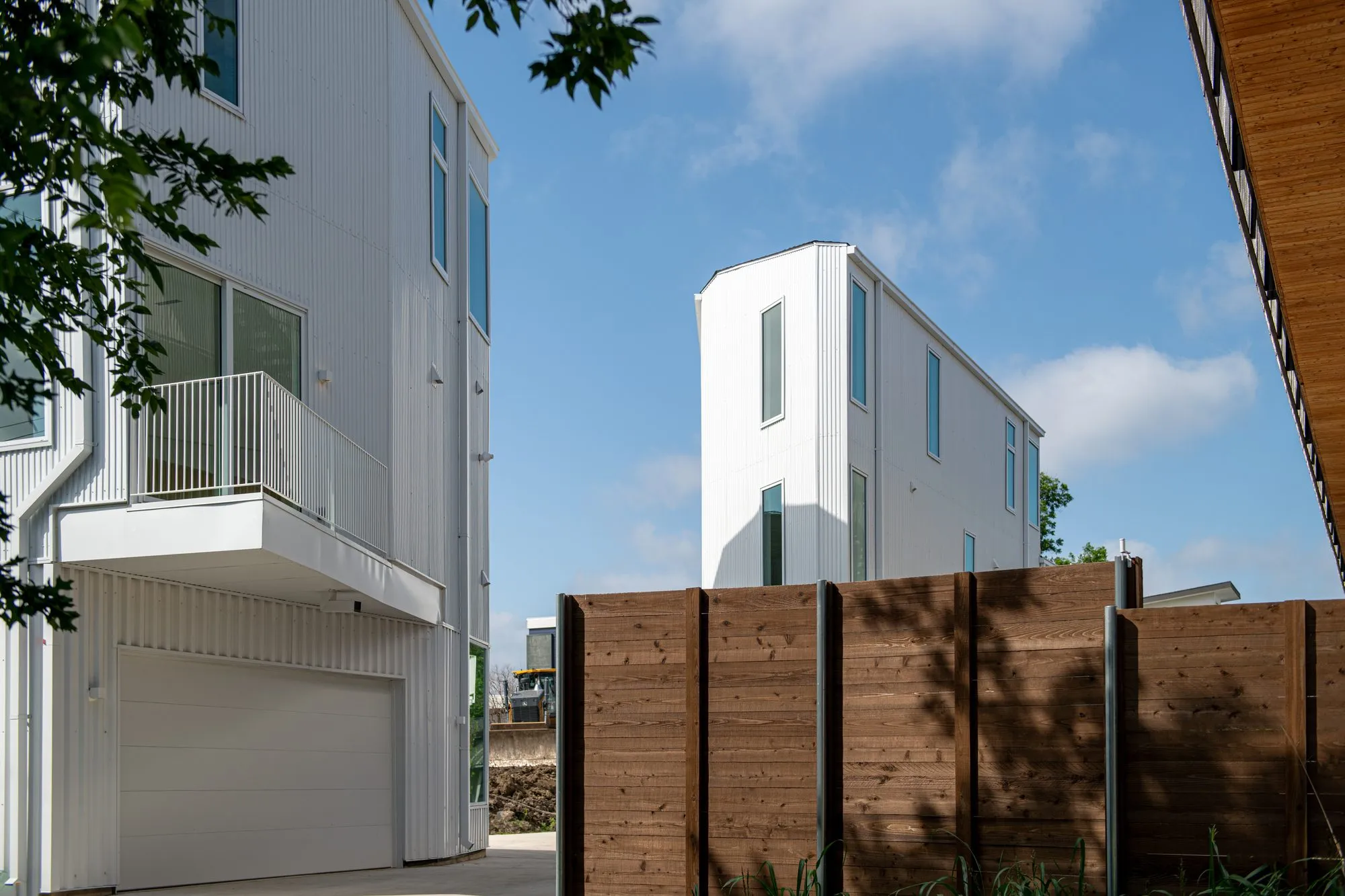 2208 Moser Avenue: balcony and wood privacy fence