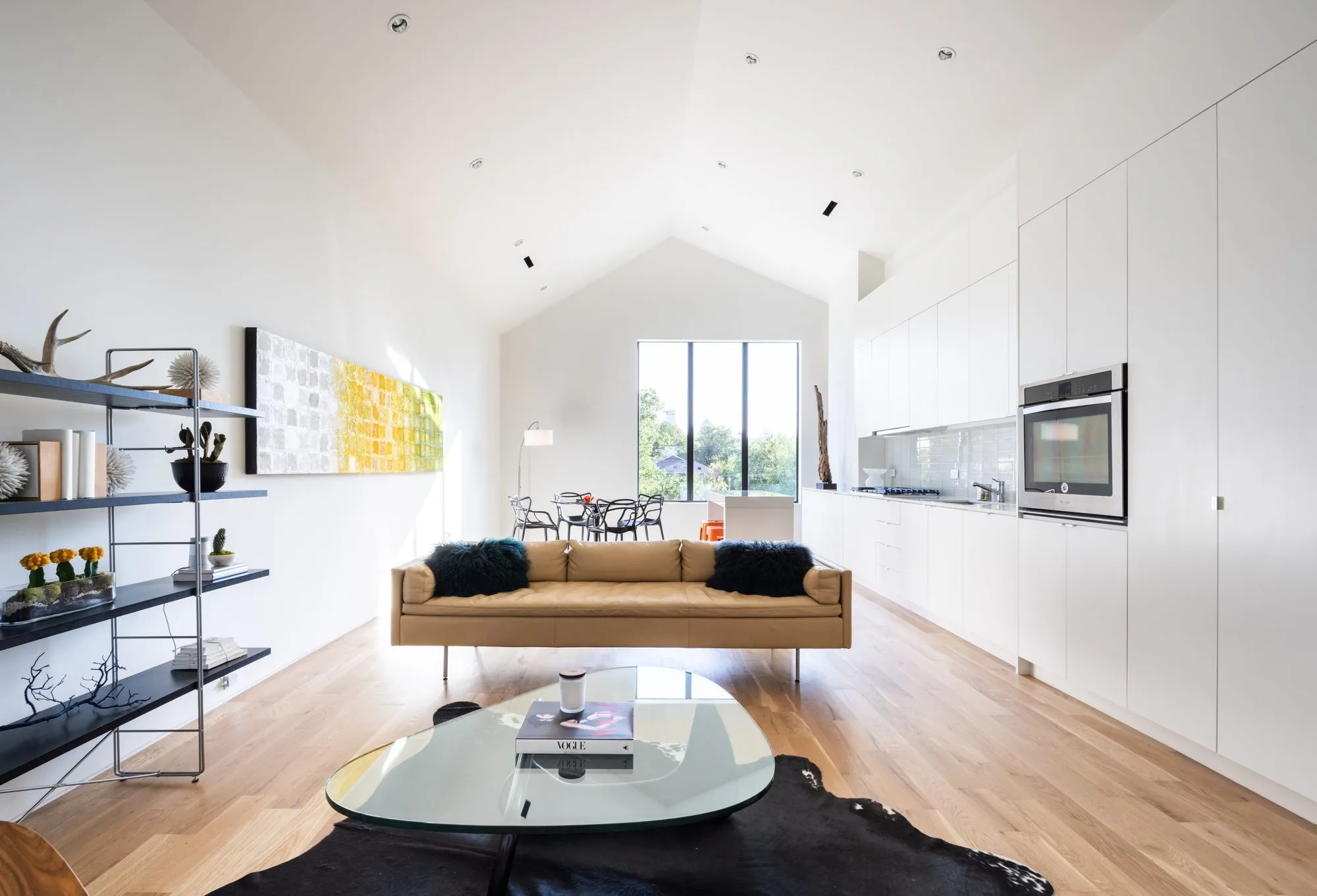 4401 Scurry Street: living room with a vaulted ceiling