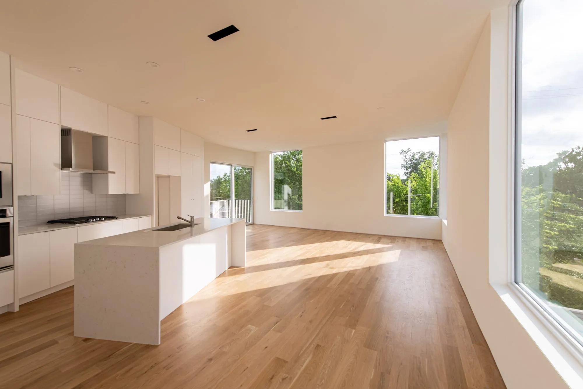 2208 Moser Avenue: kitchen and living area with wood floors