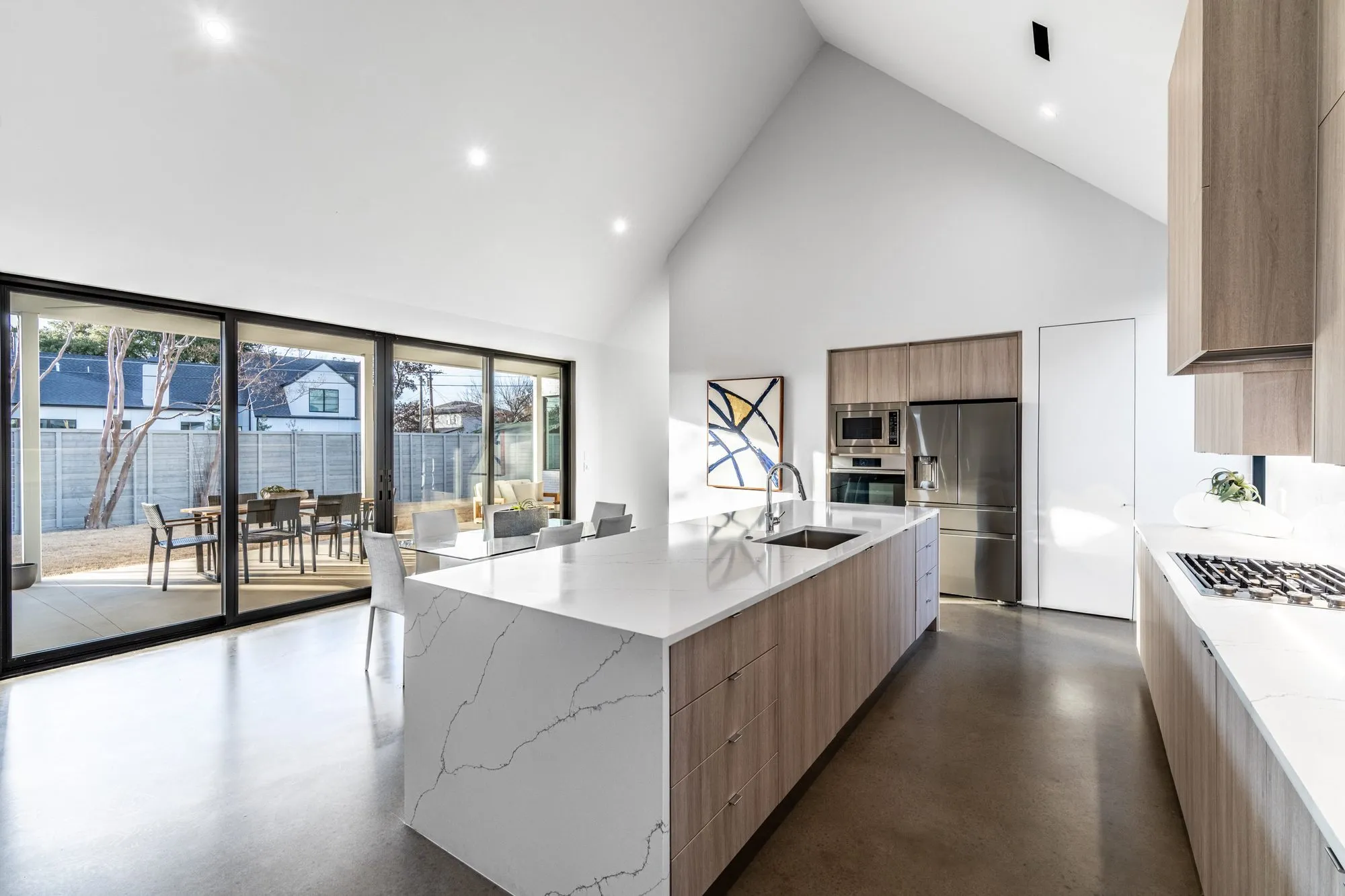 3805 Eaton Drive: kitchen island looking out through sliding glass doors