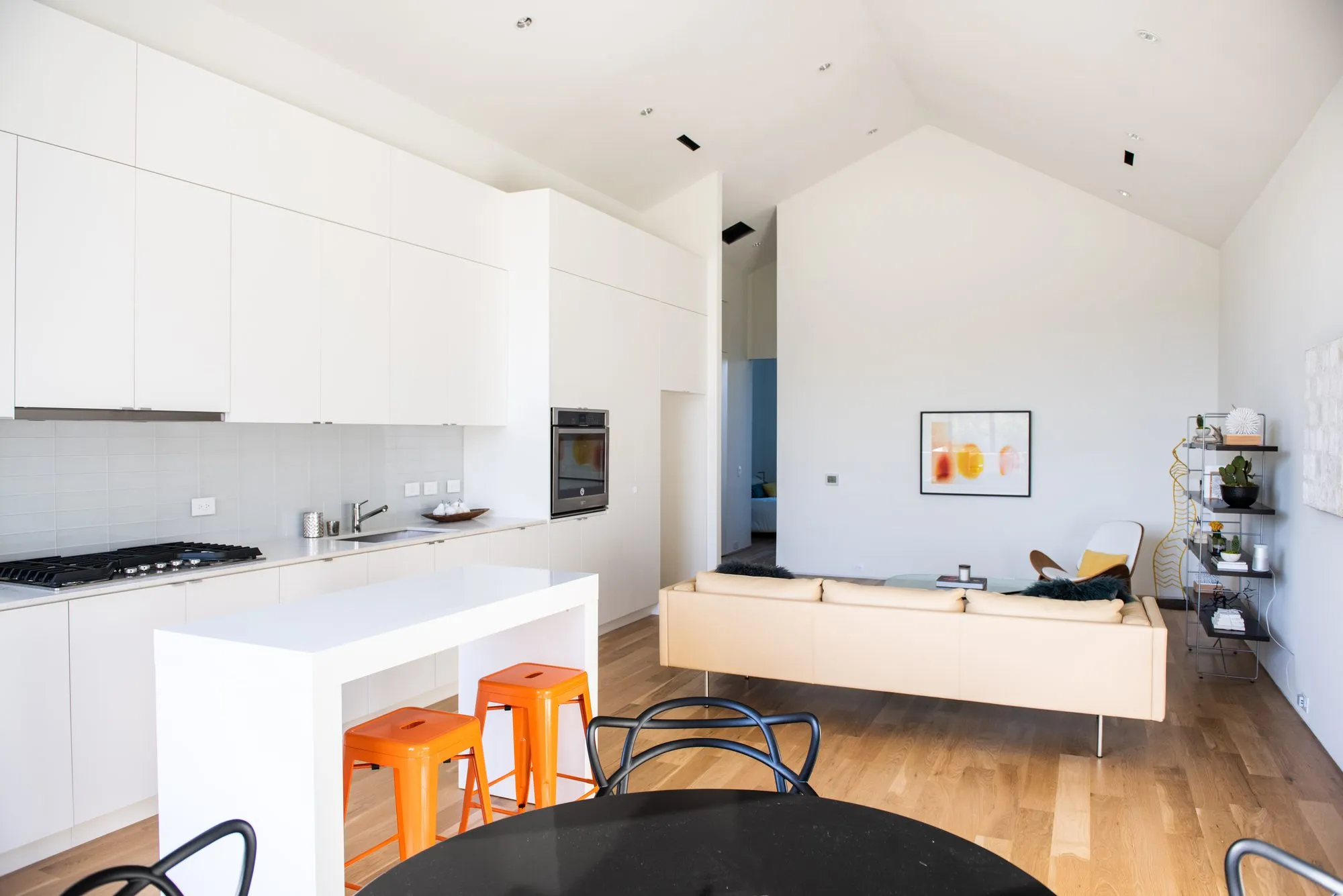 4401 Scurry Street: white kitchen with an island