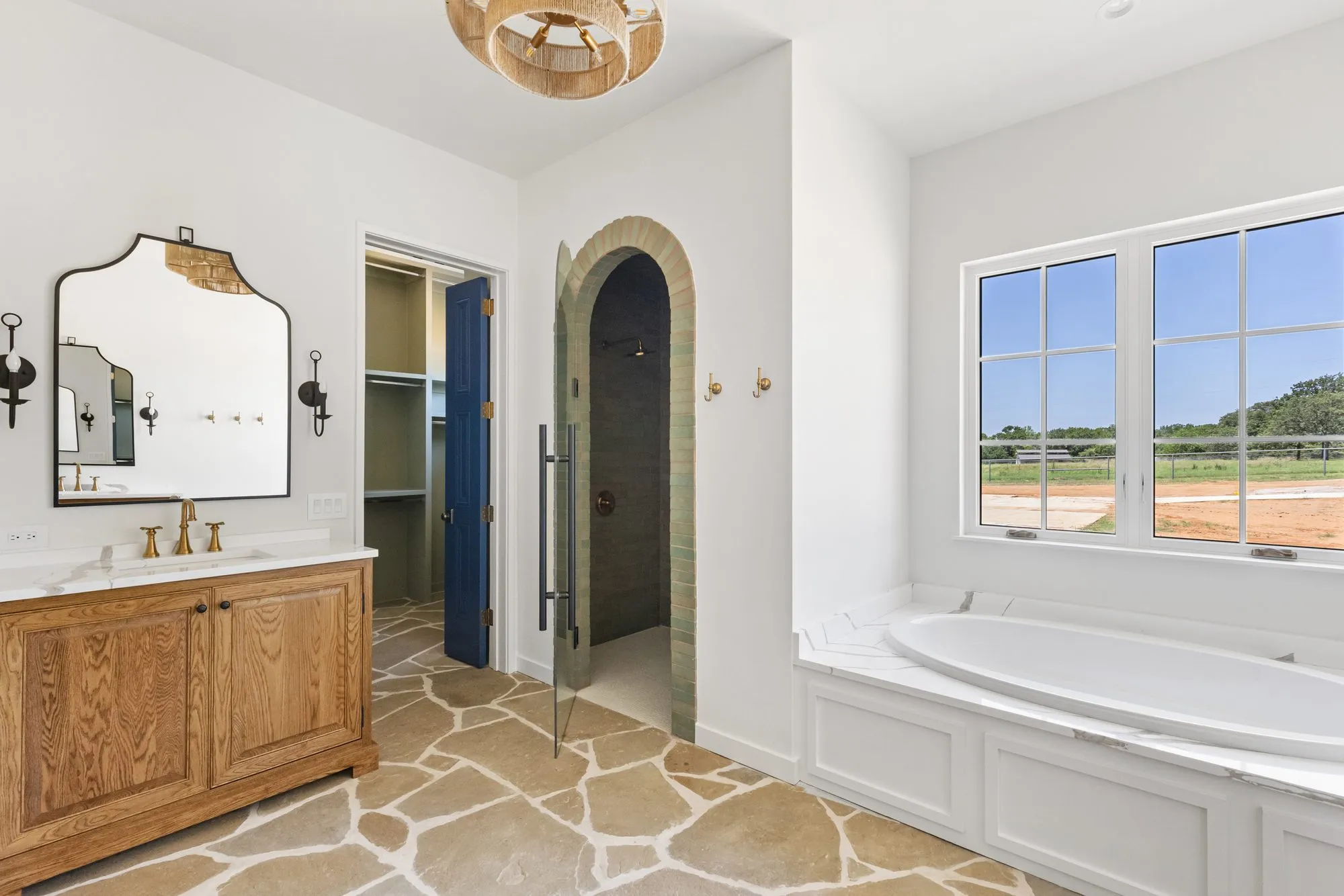 721 Eagles Landing: bath with a wood vanity and a soaking tub