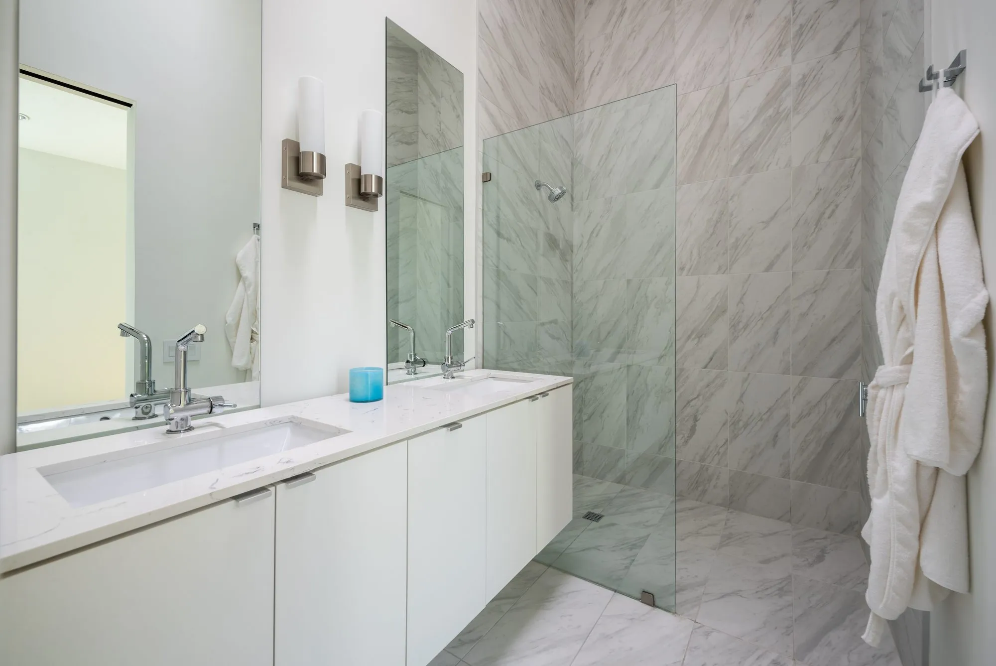 4401 Scurry Street: bath with a double vanity and a glass shower
