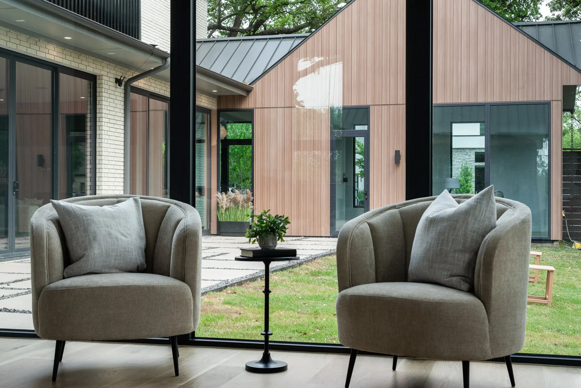 4103 Saranac: two armchairs at a window facing the courtyard