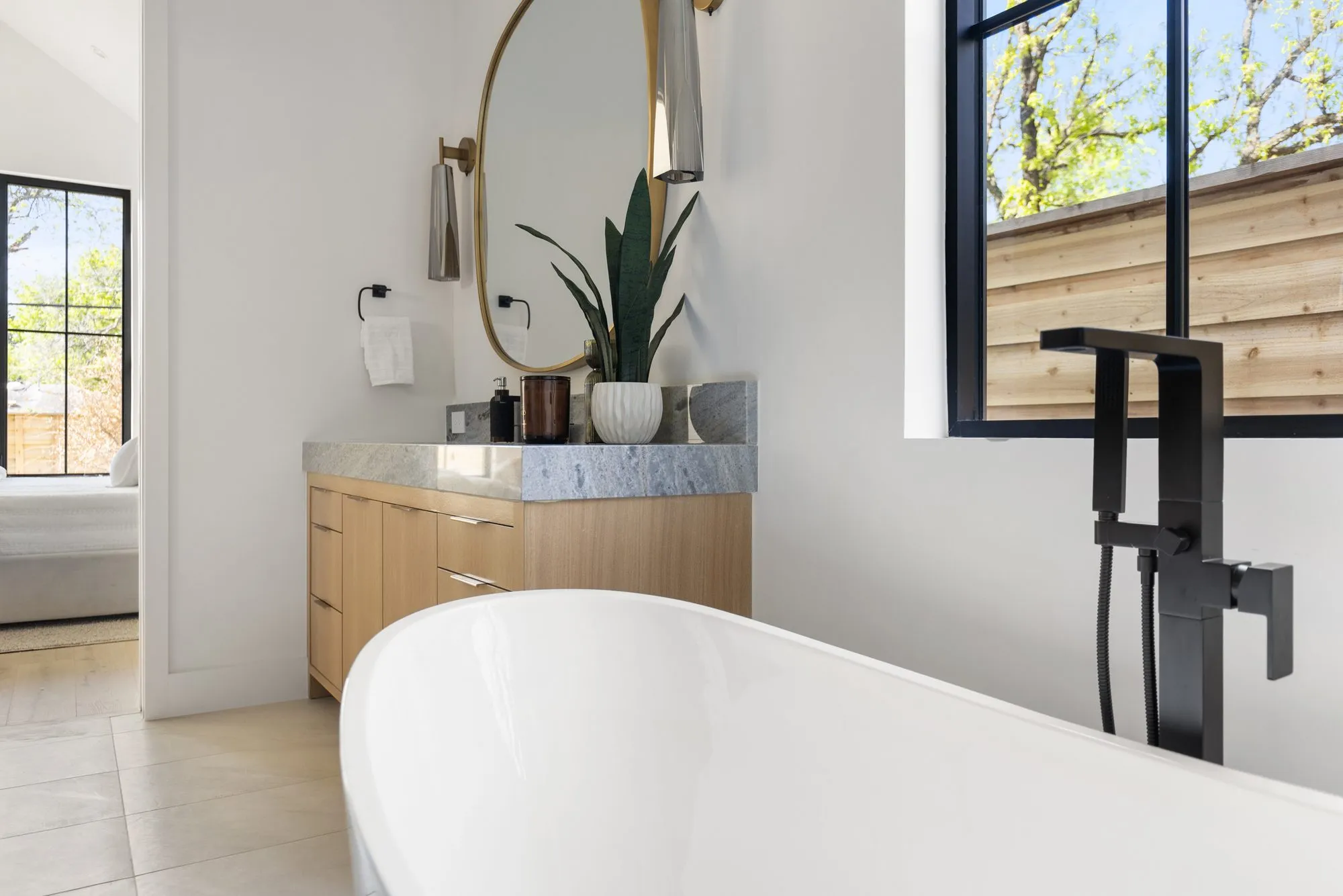 3880 Durango: freestanding tub beside a window