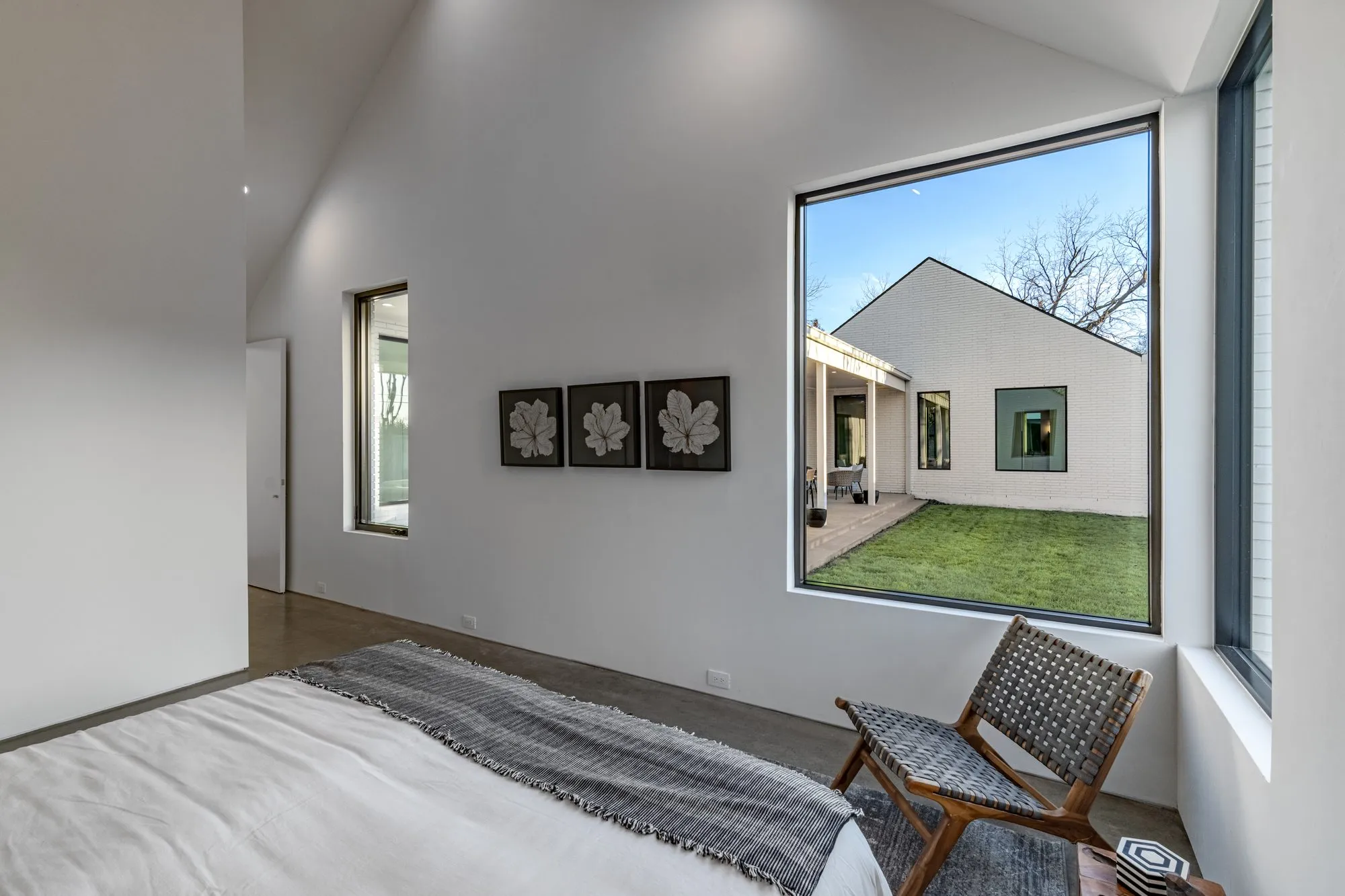 3805 Eaton Drive: bedroom with a large corner window onto the yard